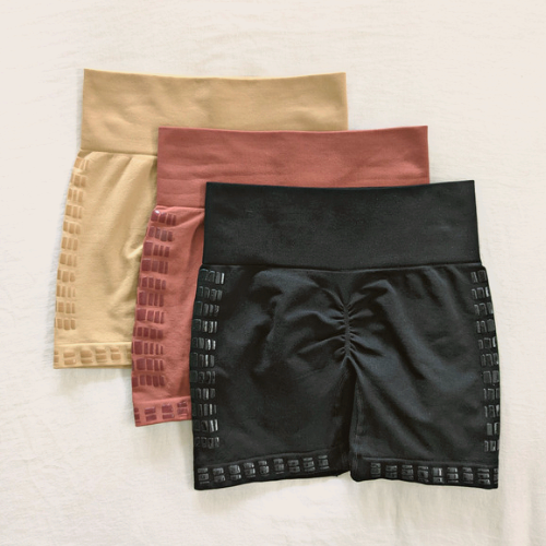 All three colours of Love Saia non slip slip shorts layered on top of each other.